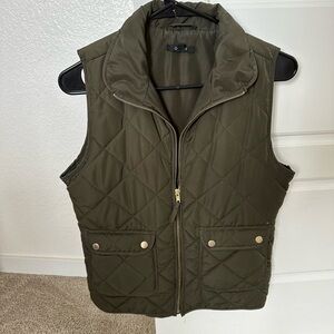 Green quilted vest for fall